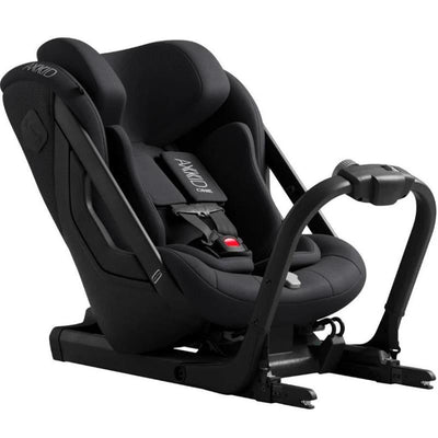 Axkid ONE 3 Extended Rear-Facing Car Seat in Coastal Storm Black with a five-point harness and adjustable headrest.