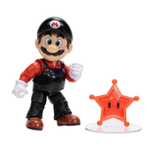 Flying Mario action figure in black overalls and red shirt, posing beside a red star item on a clear base.