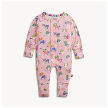 Modal convertible coverall in pink with playful patterns of books, plants, and animals, featuring a front snap closure.
