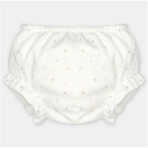 Woven fabric bloomer in Onis Beige with a light star pattern and ruffled edges.