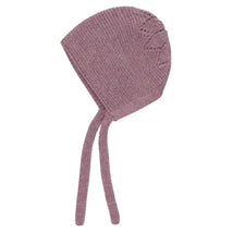 Knit bonnet in Cotswold rose color featuring decorative stitching and ties for secure fit.