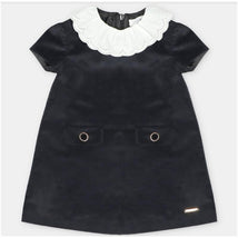 Martin Aranda black woven dress featuring a white scalloped collar and two front pockets with gold rings.
