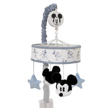 Mickey Mouse musical mobile featuring blue and white stars, plush Mickey heads, and a design of Mickey on the canopy.
