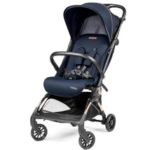 Compact blue stroller with adjustable canopy and safety harness, featuring a sleek design and spacious storage basket.