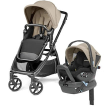 Travel system stroller featuring a sleek design in black and gray with a spacious seat, adjustable canopy, and large wheels.
