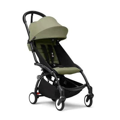 Stokke Yoyo³ stroller in black with olive green seat fabric, suitable for children 6 months and older.