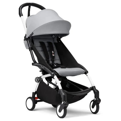 Stokke Yoyo³ stroller in stone color, featuring a lightweight frame, adjustable canopy, and comfortable seat.