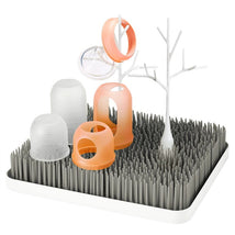 Boon LAWN drying rack accessory shaped like a white tree with multiple branches for hanging items.