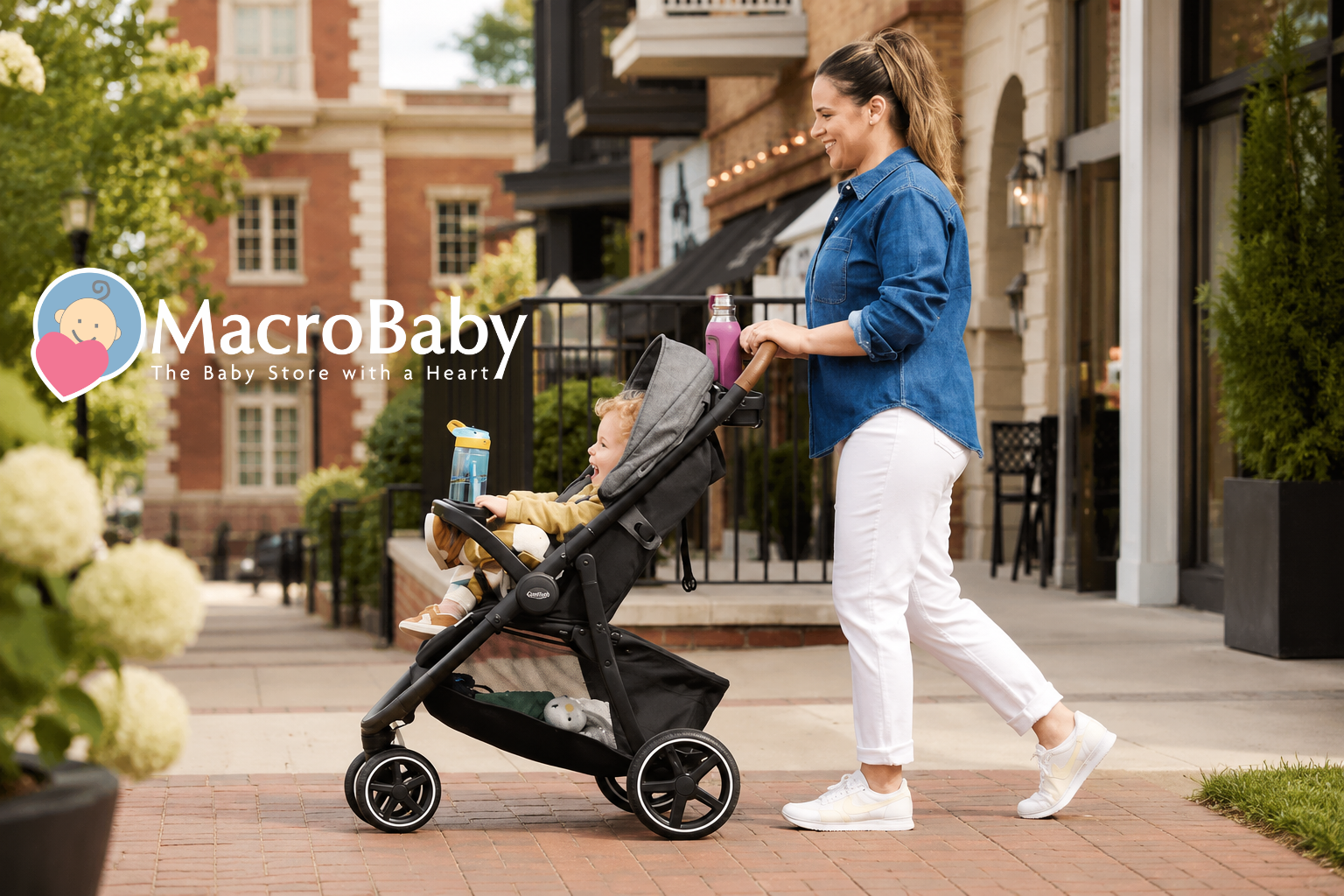 Parent pushing a stroller with toddler on a city sidewalk.