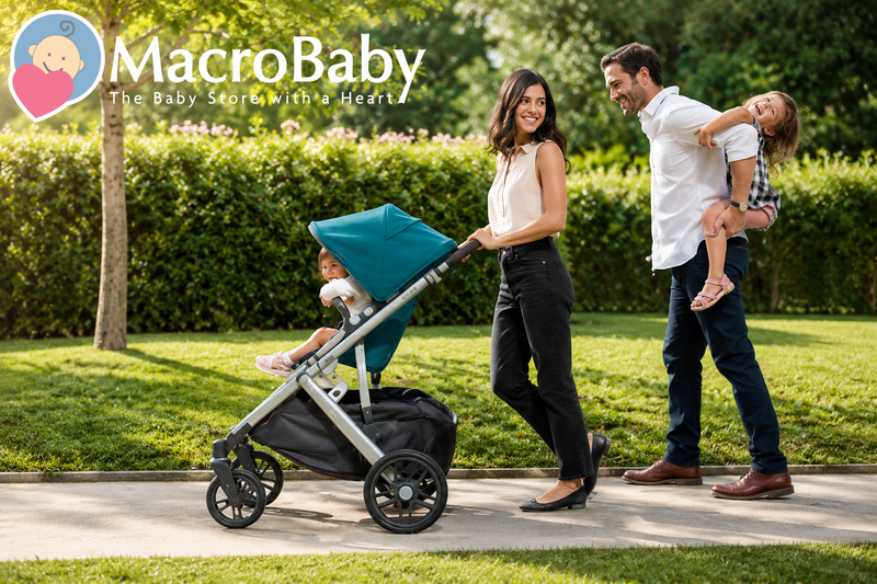 Family enjoying a walk with a teal baby stroller in a sunny park