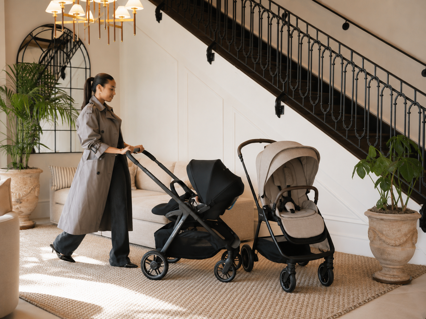Two premium strollers in a modern indoor setting.