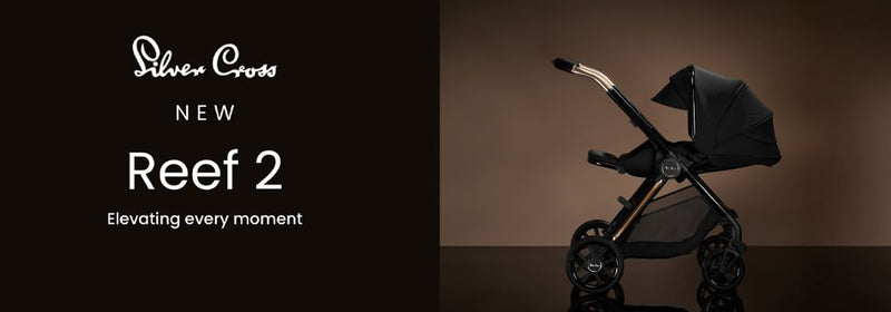 Silver Cross Reef 2 stroller in black with gold accents, sleek modern design for baby travel