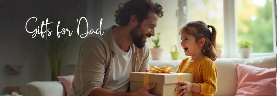Happy dad and daughter sharing a gift box with yellow ribbon, perfect for Father's Day or family occasions
