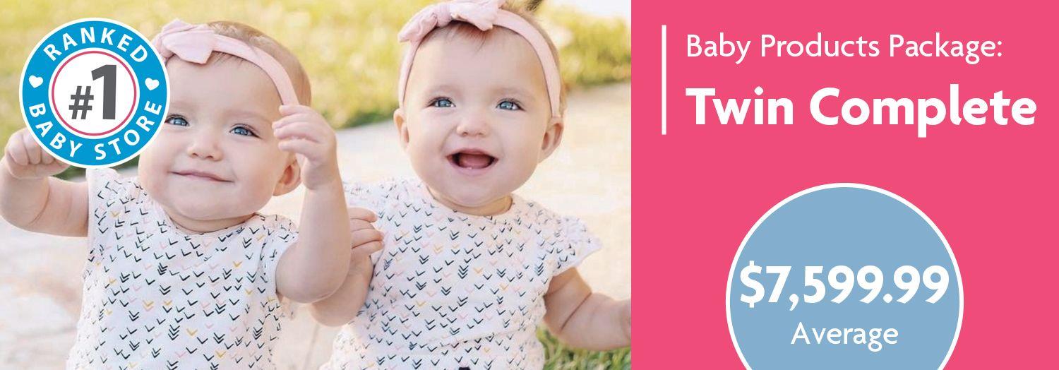 Twin baby girls in matching outfits with pink headbands, smiling outdoors