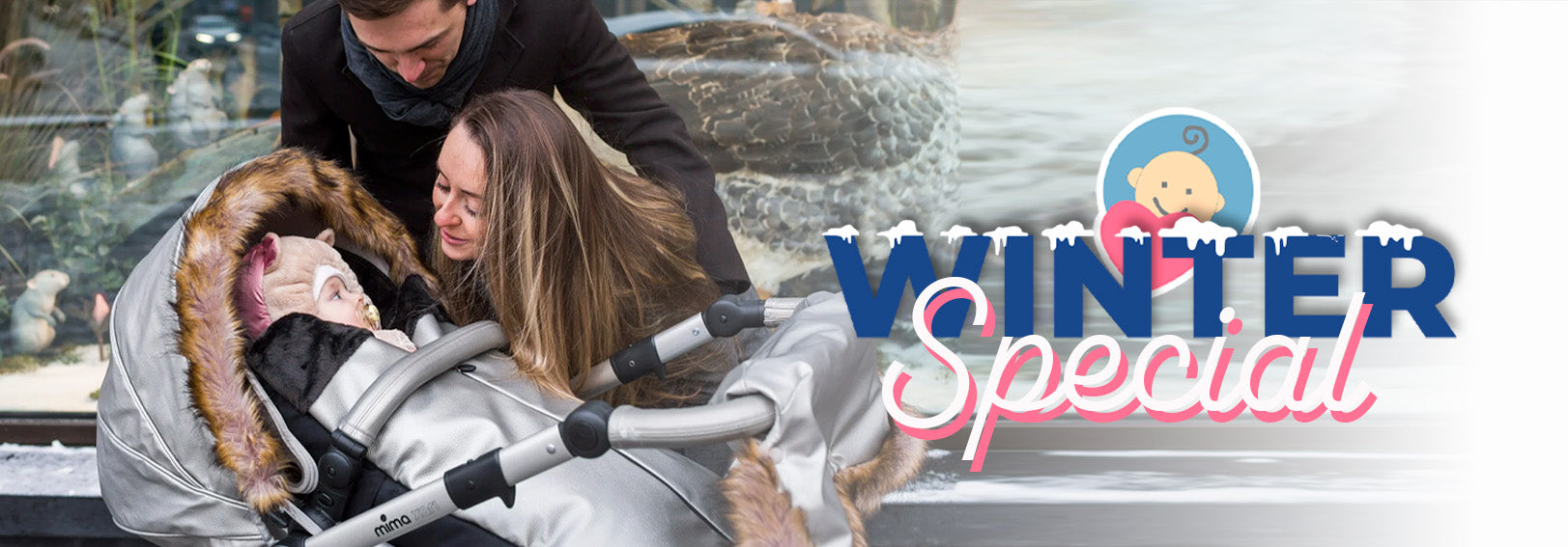 Winter Special: Parents with baby in cozy stroller, perfect for cold weather outings.