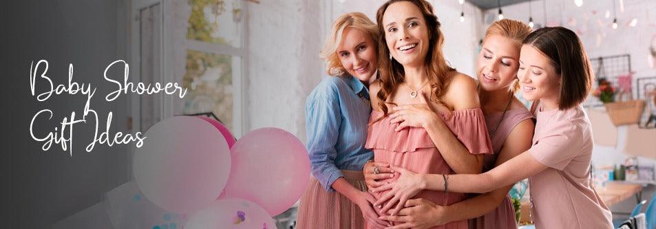 Baby shower gift ideas with pregnant woman and friends surrounded by pink balloons