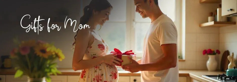 Pregnant mom receiving gift from partner in kitchen, perfect for mom gifts and baby shower ideas