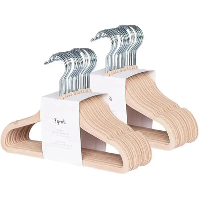 Velvet baby hangers by 3 Sprouts, non-slip, durable, pack of 15 in hazelnut color, displaying strong hooks and a textured design.