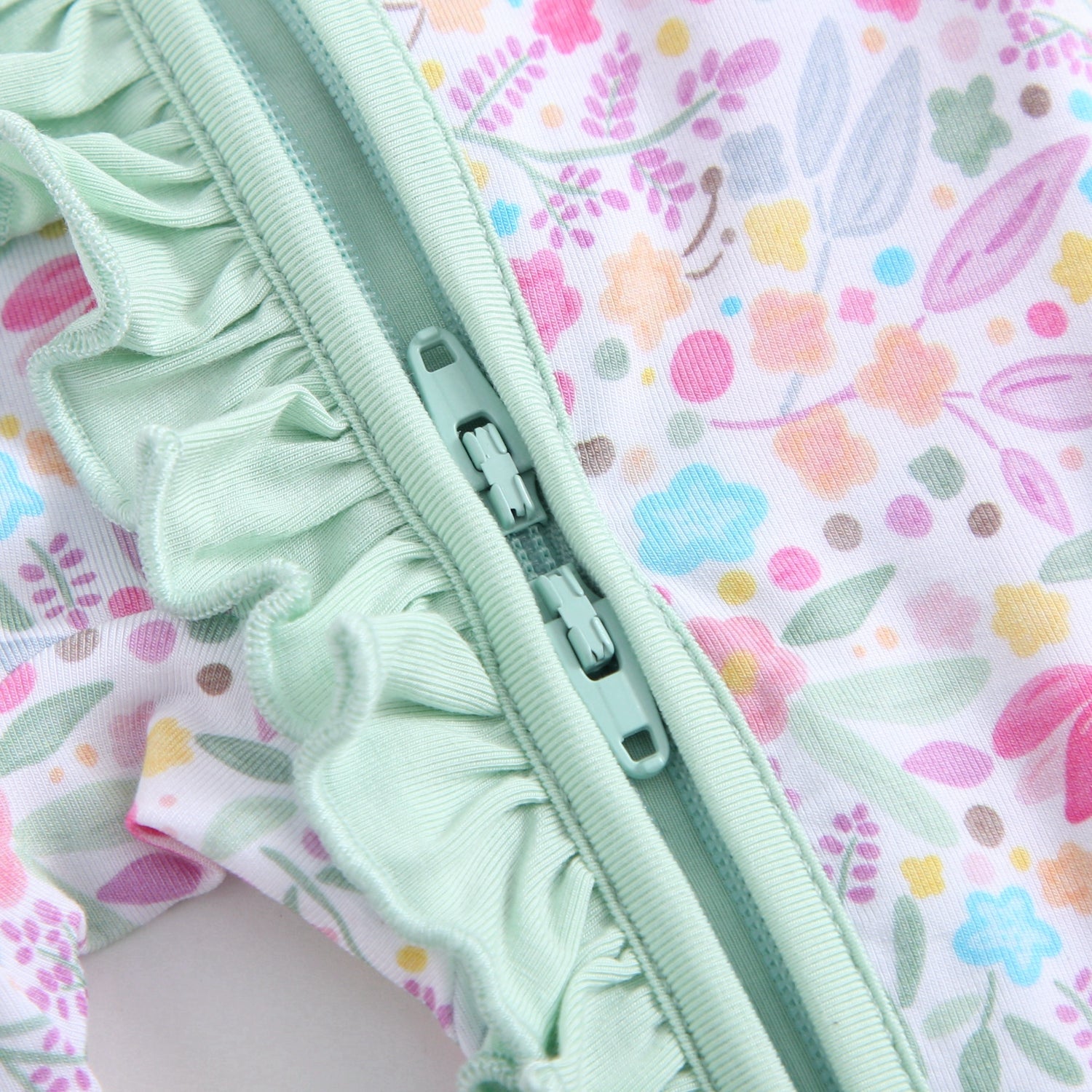 Tiny Blooms Ruffled Zippered Baby Romper