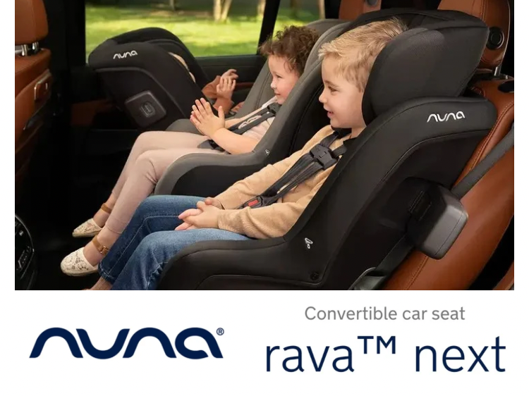 Two children in Nuna convertible car seats in a car interior.