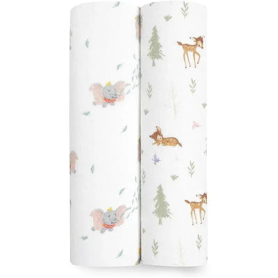 Two Aden + Anais swaddle blankets featuring Disney characters; one with Dumbo and the other with woodland animals and trees.