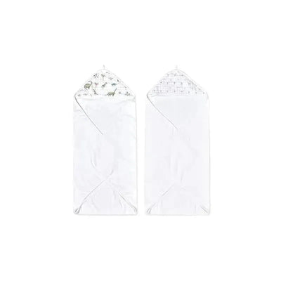 Hooded baby bath towels featuring dino jungle print, soft white material, and triangular hoods for warmth.
