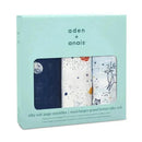 Aden + Anais 3-pack silky soft swaddles, featuring celestial designs in navy, white, and pastel colors.
