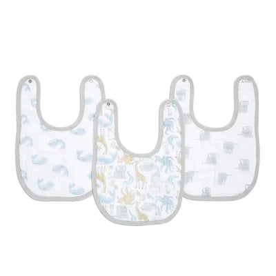 Three cotton muslin snap bibs featuring animal-themed designs in soft pastel colors, suitable for infants.