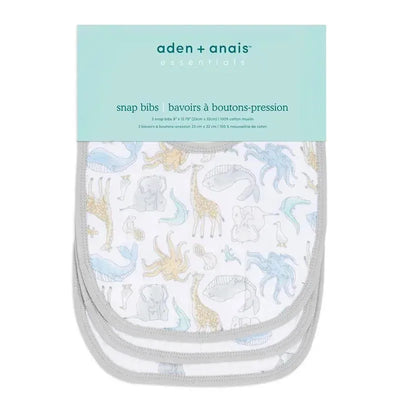 Three cotton muslin snap bibs featuring animal illustrations, packaged under the Aden + Anais brand.