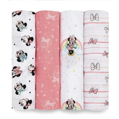 Four muslin swaddle blankets from Aden + Anais, featuring Minnie Mouse, rainbows, and pastel colors.