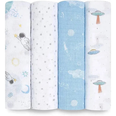 Four muslin swaddles from Aden + Anais featuring space-themed designs: astronauts, stars, planets, and UFOs in soft colors.