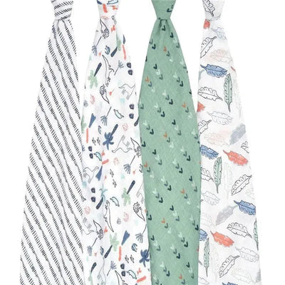 Four cotton muslin swaddle blankets featuring various patterns, including stripes, dinosaurs, and leaf designs.