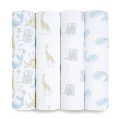 Set of four Aden + Anais cotton muslin swaddles featuring animal patterns: whales, giraffes, and elephants in soft colors.