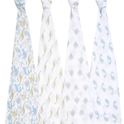 Four cotton muslin swaddles featuring playful animal designs in soft colors, part of the Aden + Anais Natural History collection.