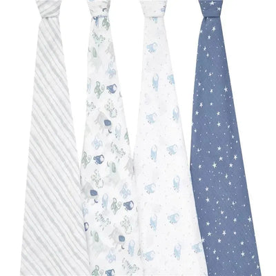 Four muslin swaddles in varying patterns: striped grey, animal prints, white with blue birds, and navy with stars.