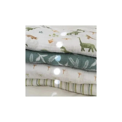 Four Aden + Anais swaddle blankets featuring dinosaur and jungle motifs in soft, breathable fabrics.