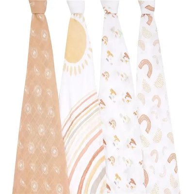 Four Aden + Anais swaddles featuring unique patterns: one with suns, one with rainbow stripes, and two with playful designs.