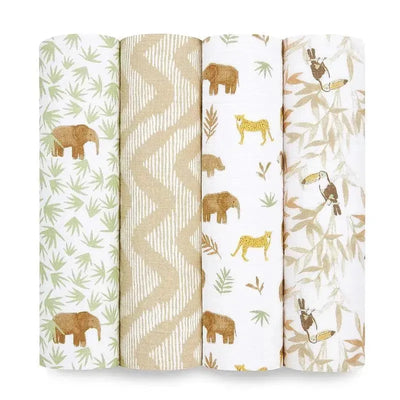 Four muslin swaddles featuring animal and plant patterns, including elephants, leopards, and toucans, in earthy colors.