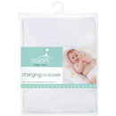 Aden + Anais white changing pad cover package featuring a baby laying on a soft changing pad with a light pattern.