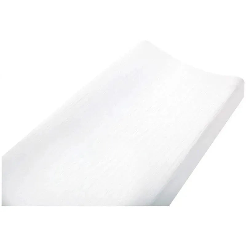Aden + Anais white changing pad cover featuring a soft, textured design, ideal for nursery use.