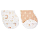 Two Aden + Anais Keep Rising Burpy Bibs, one with a rainbow design and the other in light brown with sun patterns, both featuring soft fabric.