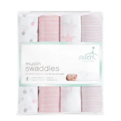 Four pre-washed muslin swaddles in pink and gray patterns, packaged with branding and care instructions.