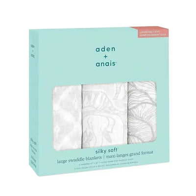 Three silky soft large swaddle blankets by Aden + Anais, packaged in a mint-colored box with floral designs.