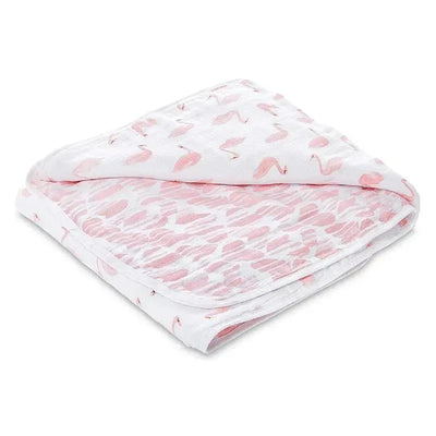 Muslin blanket by Aden with a pink swan print on one side and a softer pink pattern on the reverse.