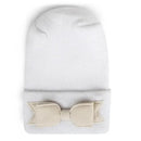 Newborn baby hospital hat in cream with a soft bow detail, designed for infant comfort and style.