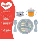 Rainbow Zig Zag Doll Accessory Set features a food plate, fork, spoon, and a sippy cup with a bear design and disappearing juice.
