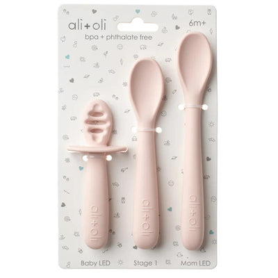 Multi-stage spoon set for babies in blush, including Baby LED, Stage 1, and Mom LED spoons, BPA-free.