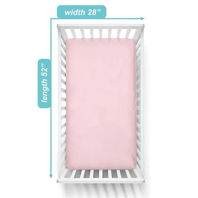 100% cotton knit jersey fitted crib sheet in pink, displayed on a white crib with measurements shown: width 28”, length 52”.