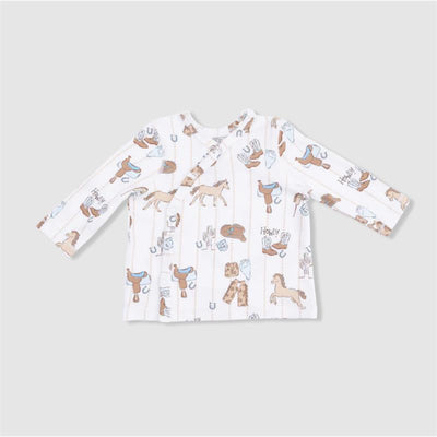 Convertible pant set featuring cowboy-themed patterns, including horses and western gear on a light background.