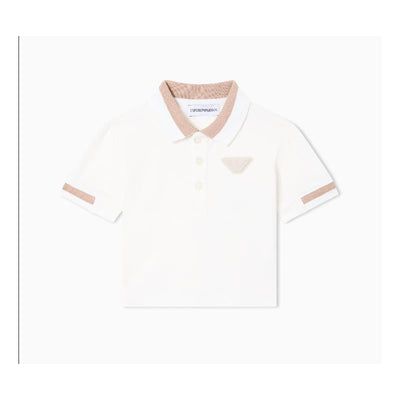 Short sleeve baby boy polo shirt in white with a textured beige collared neck and logo detail.